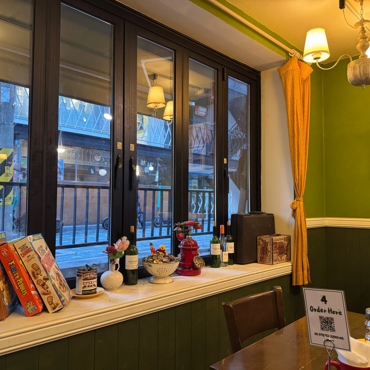Warm window display and lighting inside Hey George